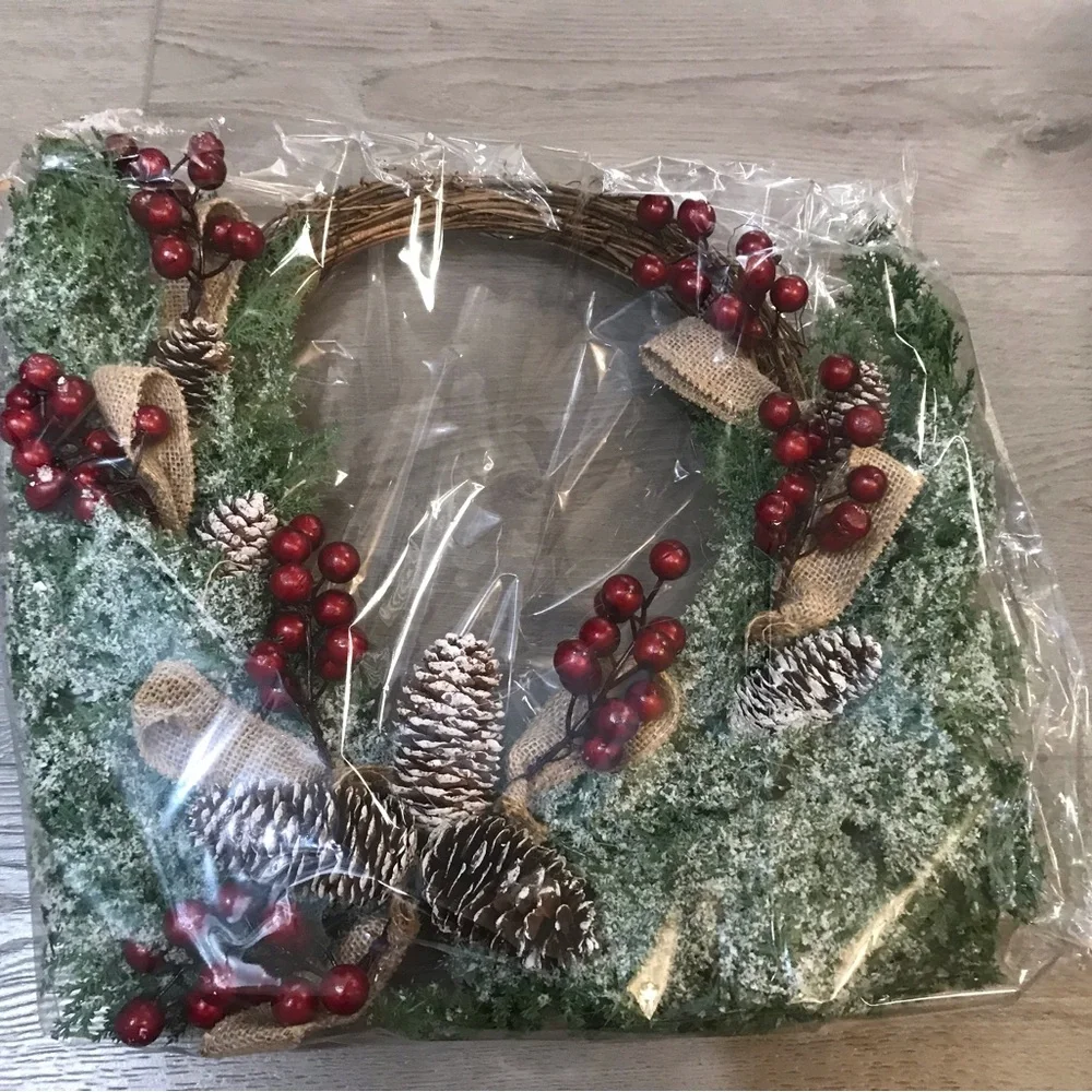 Festive Holiday Wreath with Red Berries, Pinecones and Artificial Snow